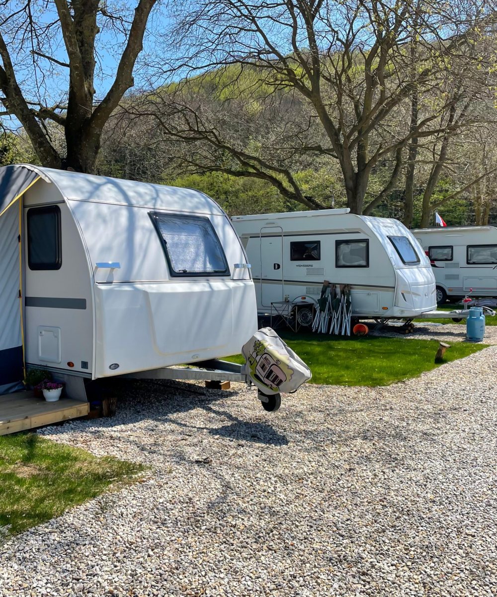 Caravan campsite with travel trailers in a row. Riva, Istanbul, Turkey - April 04, 2022.
